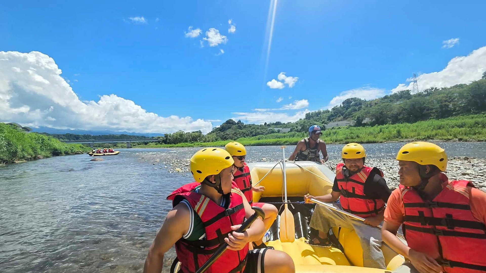 Dream Adventure raft on the Tone River with guests paddling